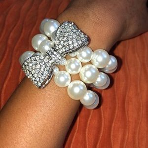 White House Black Market Jewelry - Pearl and diamond bow stretch bracelet White House Black Market Jewelry - Pearl and diamond bow stretch bracelet